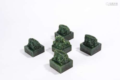 Set of Five Chinese Green Jade Inscribed Dragon Seals