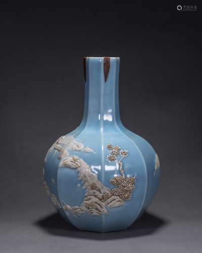 “大清乾隆年制”款天藍釉浮雕山水紋八棱瓶