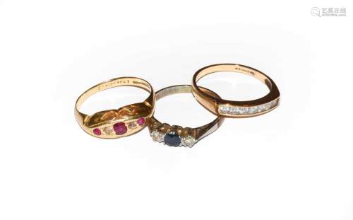 A 9 carat gold diamond half hoop ring, finger size M; a sapp...