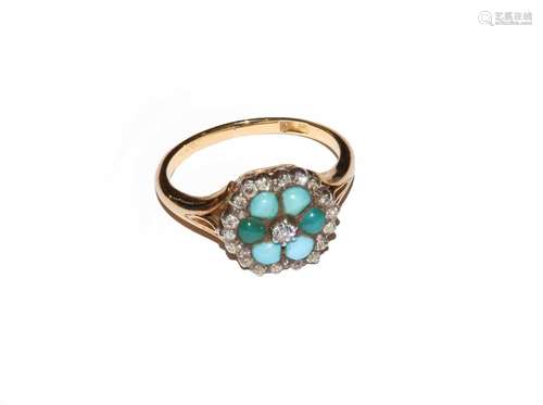 A turquoise and diamond cluster ring, stamped 18CT, finger s...