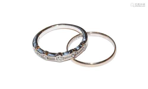 A platinum diamond half hoop ring, round brilliant cut diamo...