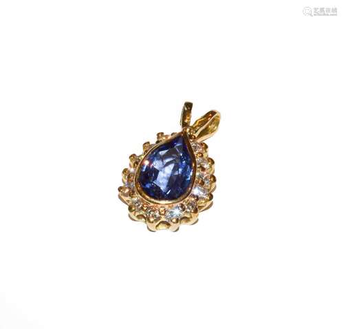 A tanzanite and diamond cluster pendant, the pear shaped tan...