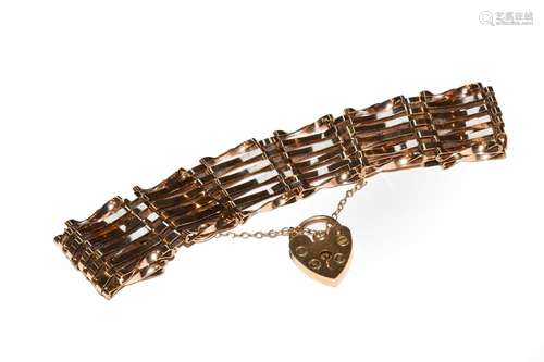 A 9 carat gold gate link bracelet with a padlock clasp, leng...