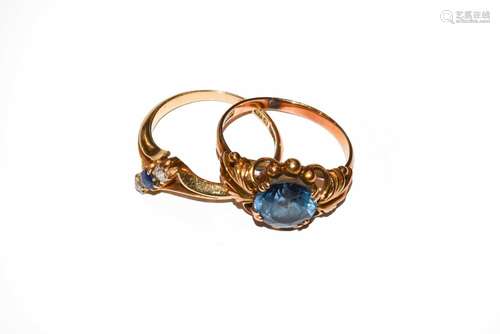 An 18 carat gold sapphire and diamond three stone ring, fing...