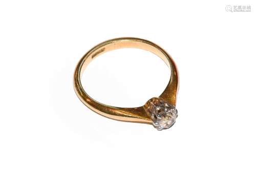 A diamond solitaire ring, stamped 18CT, finger size J1/2Cond...