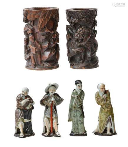 Four 19th century Chinese porcelain figures decorated in nat...