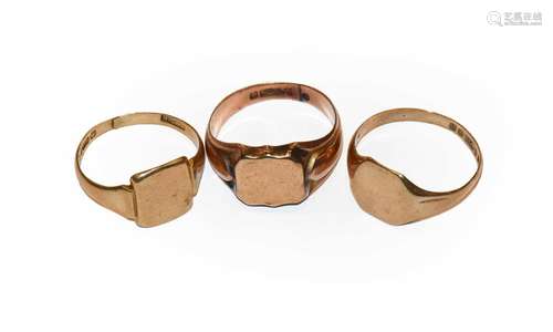 Three 9 carat gold signet rings, finger sizes R1/2 and R1/2 ...