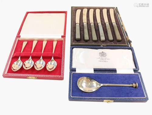 A collection of assorted silver, including a pair of napkin ...