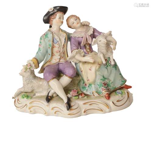 A 20th century Sitzendorf figure of a courting couple with t...