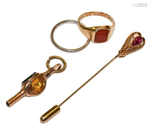 A synthetic pink sapphire stickpin, stamped 14K; a 9 carat g...