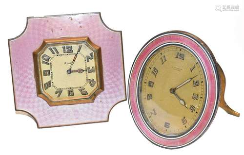 ~ An early 20th century oval strut timepiece with pink guill...