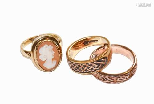 A 9 carat gold cameo ring, finger size J1/2; and two 9 carat...