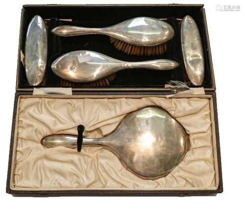 A five-piece George V cased silver dressing table set, Birmi...