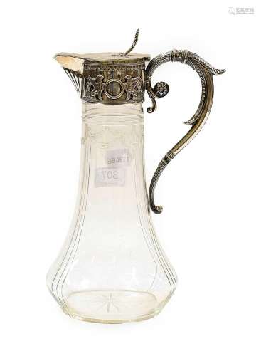 A cut-glass claret jug with Continental white metal mounts, ...