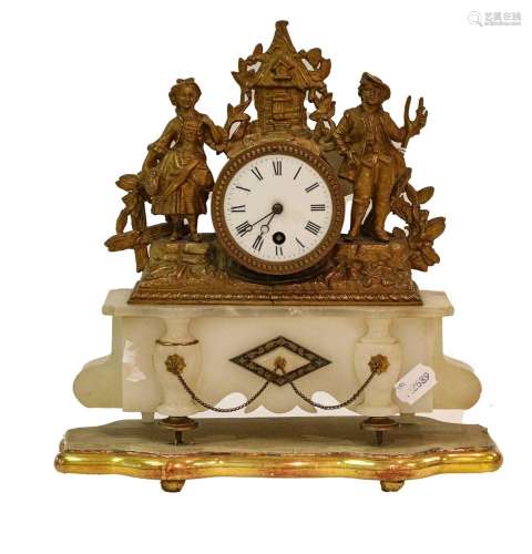 A late 19th century gilt metal and alabaster timepiece, the ...