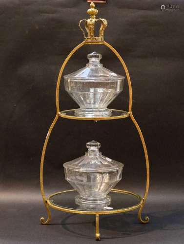 A gilt metal and glass two-tier cake stand with crown finial...