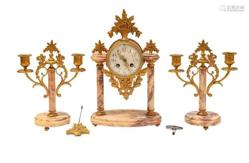 A marble portico striking mantel clock and garniture, early ...