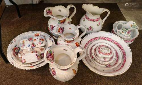 An early 19th century part toilet set, perhaps Coalport, dec...