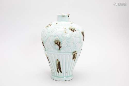 A CARVED QINGBAI-GLAZED AND BROWN-SPLASHED VASE