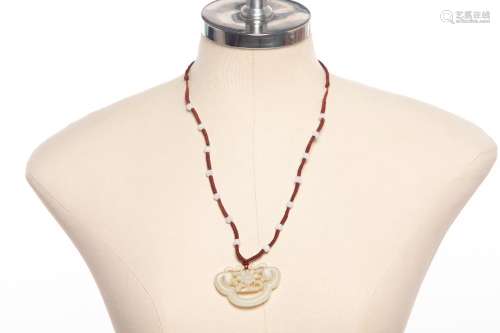 TWO WHITE JADE PENDANTS AND A NECKLACE