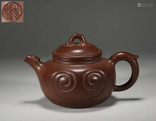 Ruyi grain purple sand pot from The Qing Dynasty