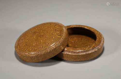 Twisted enamel powder box in Tang Dynasty China