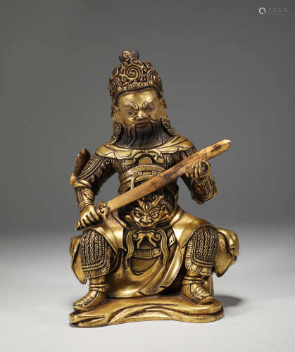 Qing dynasty bronze gilt king of Heaven sitting statue