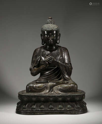 Bronze Buddha sitting in Ming Dynasty of China