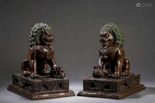 Pair Of Bronze Lion Ornaments