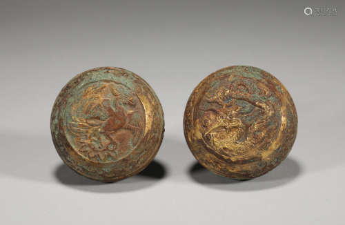 A pair of gilt dragon and Phoenix pattern sarira boxes were ...