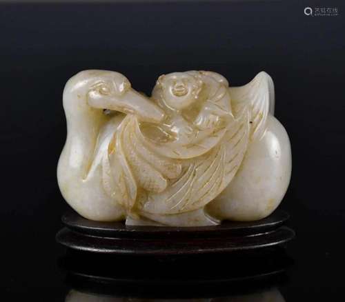 A White Jade Goose and Child Carving w/Stand Qing