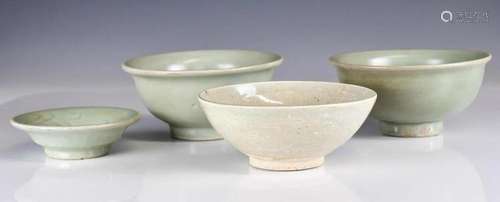 A Group of Four Celadon Plates and Bowls