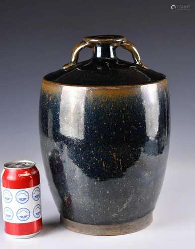 A Large Black Glazed Jar