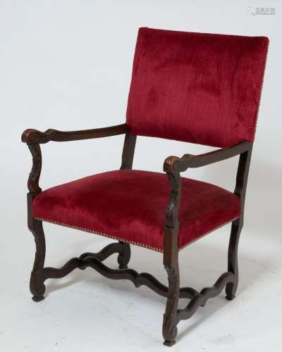 A Louis XIII style oak armchair, early 20th century