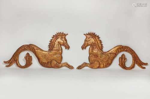 A pair of giltwood hippocamp reliefs, 20th century