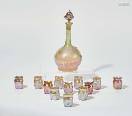 A thirteen piece Tiffany Studios Favrile glass cordial suite...