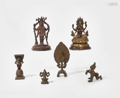 Six Southeast Asian patinated metal models of deities