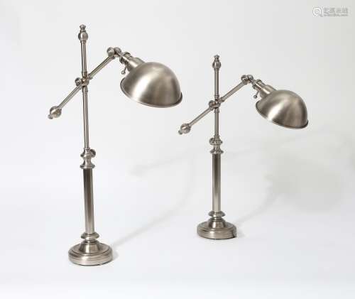A pair of brushed aluminum finish single arm adjustable lamp...