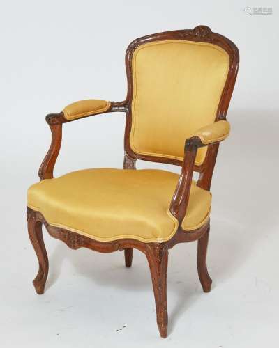 A Louis XV Provincial carved beechwood armchair, second half...