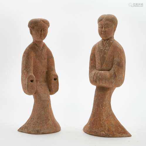 Two Chinese pottery models of attendants