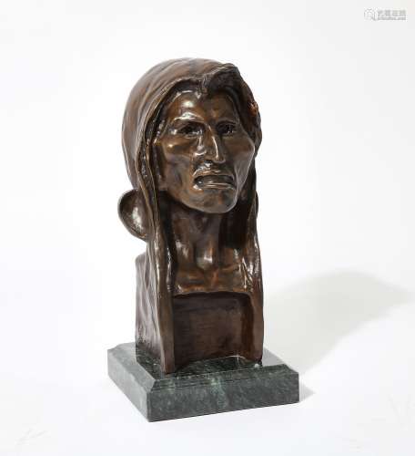 An American patinated bronze bust of a Native American, afte...