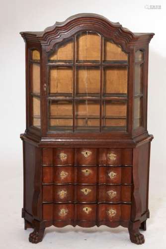 A Dutch Baroque style oak vitrine cabinet on chest, 19th cen...