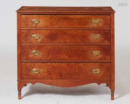 A Federal inlaid fruitwood bowfront chest, early 19th centur...