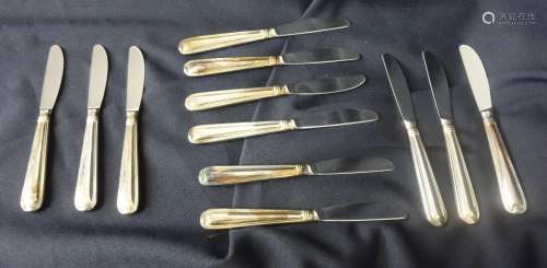 TWELVE SILVERPLATED SMALL KNIVES