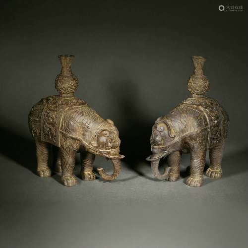 A Pair of Bronze Elephant Candlestick