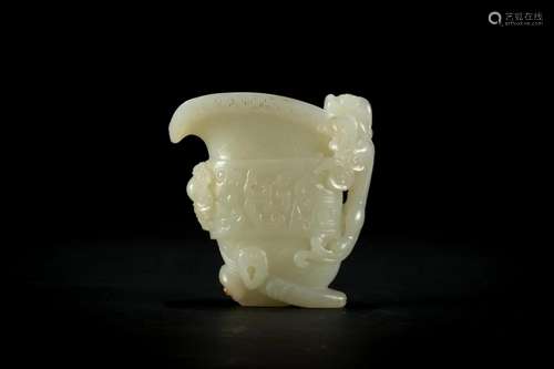 A Carved Hetian White Jade Dragon Jue Cup