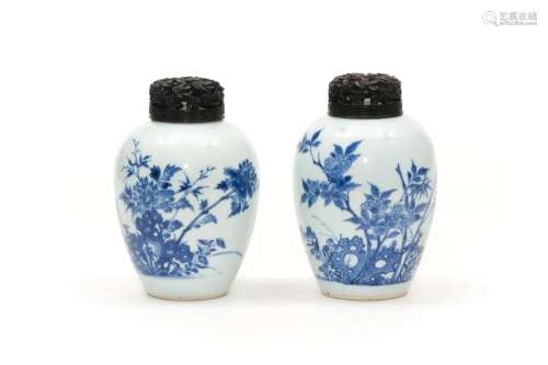 A Pair of Blue and White Flower and Bird Jars with Lids