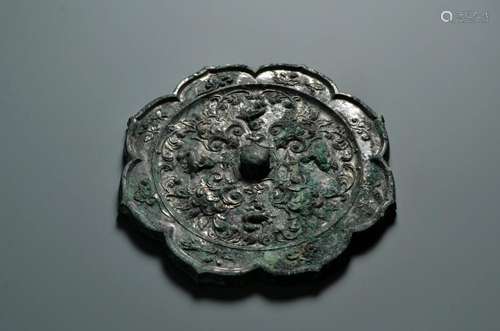 A Lobed Bronze Mirror with Floral