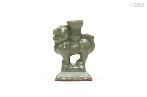 A Longquan Celadon Lion Form Candle Holder