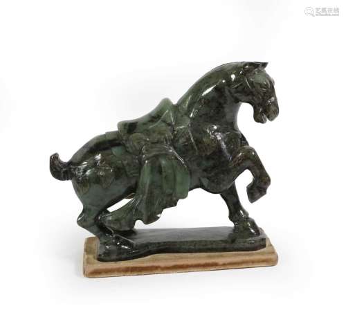 A Chinese Spinach Jade Model of a Horse, in Tang style, with...